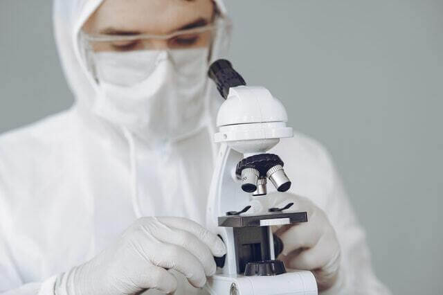 Removal of contaminating DNA from commercial nucleic acid extraction kit reagents